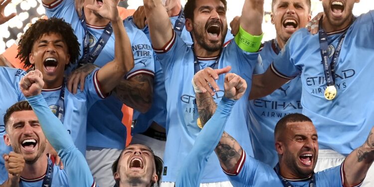 ISTANBUL, TURKEY - JUNE 10: Ilkay Guendogan of Manchester City lifts the UEFA Champions League trophy after the team's victory in the UEFA Champions League 2022/23 final match between FC Internazionale and Manchester City FC at Atatuerk Olympic Stadium on June 10, 2023 in Istanbul, Turkey. (Photo by Michael Regan - UEFA/UEFA via Getty Images)