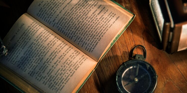 An old book on a wooden table